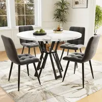 OKWISH Eetset (5-delig): Eetset met een ronde keukentafel en 4 eetstoelen. Bevat: Eettafel, 4 eetstoelen. Kleur: Wit tafelblad, zwarte poten. Kleuren: Grijs, wit en zwart