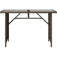 vidaXL Tuintafel met glazen blad 110x68x70 cm poly rattan bruin