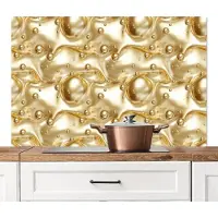 KitchenYeah Spatscherm keuken 120x80 cm - Kookplaat achterwand Vloeibaar - Druppels - Goud - Muurbeschermer - Spatwand fornuis - Hoogwaardig aluminium