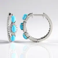 Cavill - Zilveren Oorbellen - 925 Sterling Zilver - 6 Sleeping Beauty Turkoois 1 35 ct - 56 Sprankelende Zirkon - Elegante Ovale Cabochon