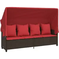 vidaXL Ligbed met luifel en kussens poly rattan bruin