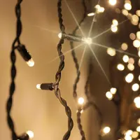 LumenXL Lichtgordijn koppelbaar zwart | vanaf 2 meter | 300 LEDs | 2200K extra warm wit met twinkel | rubber