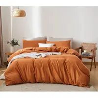 Unyqoos Ademend dubbel mousseline beddengoed in karamel bruin met ritssluiting