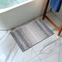 Unyqoos Grijs-witte badmat van katoen met antislip en wasbare eigenschappen