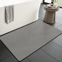 Unyqoos Grijze antislip badmat 43x70 cm voor badkamer en douche, sneldrogend