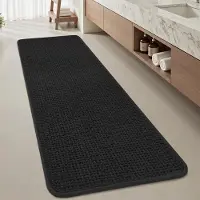 Unyqoos Zachte en absorberende zwarte badmat met antislip en wasbare eigenschappen