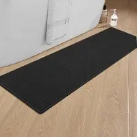 Unyqoos Zwarte antislip badmat met rubberen achterkant voor veilige badkamers