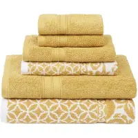 Unyqoos Luxe 6-delige handdoekenset met omkeerbaar jacquard ontwerp in goud