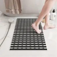 Unyqoos Zwarte antislip badmat met voetmassage en afvoergat voor douche en badkuip