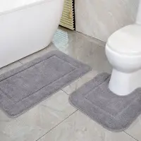 Unyqoos Grijze badmatten set van microvezel met antislip en sneldrogende eigenschappen