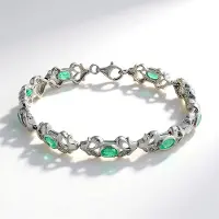Cavill - Zilveren Armband - 925 Sterling Zilver - 9 Zambia Smaragden 3.87 ct, 36 Witte Saffieren - Elegant, Luxe Sieraad met Ovale Groene Edelstenen