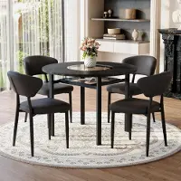 STILVORA Eettafelset, rond, met 4 stoelen van Polyurethanmateriaal en comfortabele rugleuning. Ronde tafel, diameter 100 cm, met zwarte houtlook. Eetset voor de woonkamer, zwart