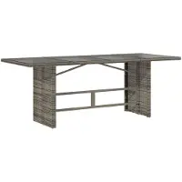 vidaXL Tuintafel met glazen blad 190x80x75 cm poly rattan grijs