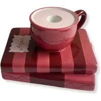 House Vitamin Candle holder cup on pile of books red/pink dolomite 16,5x13,5x9,5cm