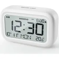 Famanu - Digitale reiswekker op batterijen, LCD-display, snooze- en weekendmodus, compacte tafelklok