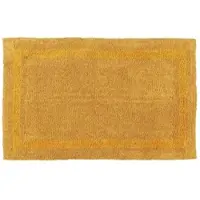 Homescapes XXL badmat mosterdgeel 70x120 cm gemaakt van 100% katoen