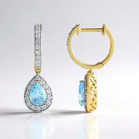 Cavill - Zilveren Oorbellen 925 Sterling Zilver - Verguld - Hemelsblauwe Peervormige Topaas 1,71 ct & Zirkonia 0,83 ct - Elegant