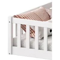 Idimex Vloerbed GUSTAVO met uitvalbescherming massief grenen - wit 90 x 190 cm Vloerbed met uitvalbescherming Montessori kinderbed - ambiente