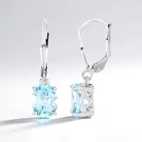 Cavill - Hemelsblauwe Ovale Topaas Oorbellen - 925 Sterling Zilver met Platina Coating - 4,206 ct - Luxe Edelsteen oorbellen voor Dames