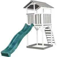 Axi Beach Tower Speeltoestel van hout in Grijs en Wit | Speeltoren met zandbak, en groene Glijbaan | Speelhuis op palen voor de tuin