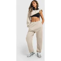 Nike Oversized damesbroek met hoge taille en omgeslagen pijp Studio Fleece middelzwaar - Bruin- Dames, Bruin