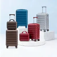 HAUSS SPOLE Reiskofferset 2-Delig Met Cijferslot - 14 En 19 Inch - ABS Hardcase - Zilver - Spinnerwielen En Kosmetiktas Voor Weekendtrips
