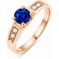 LGT JWLS Rosegoudkleurige Damesring met Blauwe Ronde Zirkonia en Vier Zijstenen - 16mm