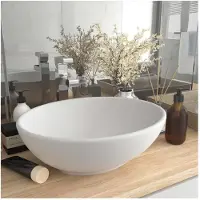 vidaXL Wastafel ovaal 40x33 cm keramiek matcrème